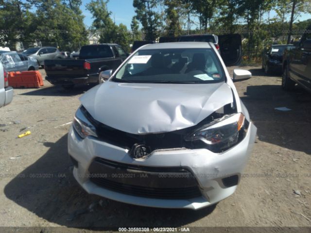 Photo 5 VIN: 2T1BURHE9EC217951 - TOYOTA COROLLA 