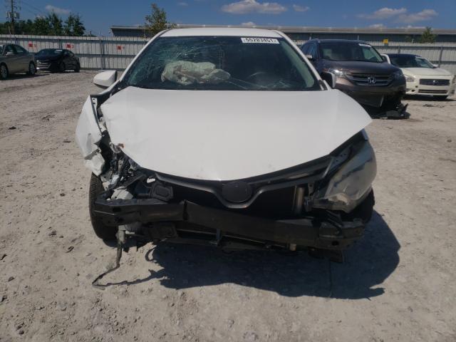 Photo 8 VIN: 2T1BURHE9EC223734 - TOYOTA COROLLA L 