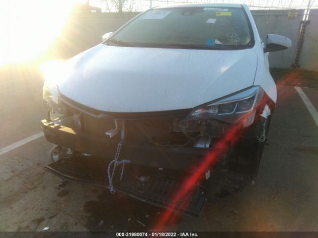 Photo 5 VIN: 2T1BURHE9JC033376 - TOYOTA COROLLA 