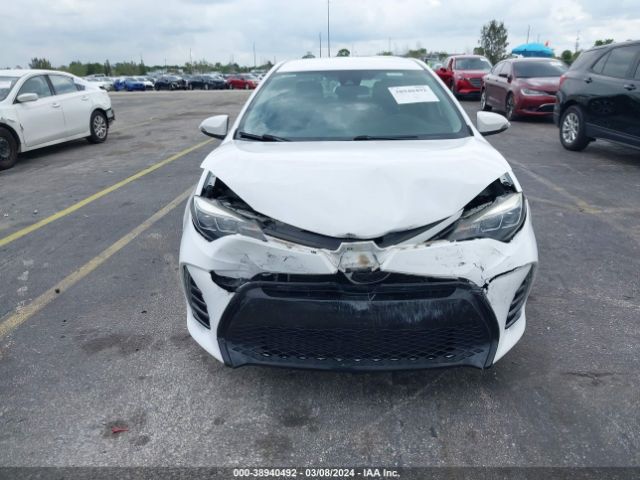 Photo 5 VIN: 2T1BURHE9JC063395 - TOYOTA COROLLA 