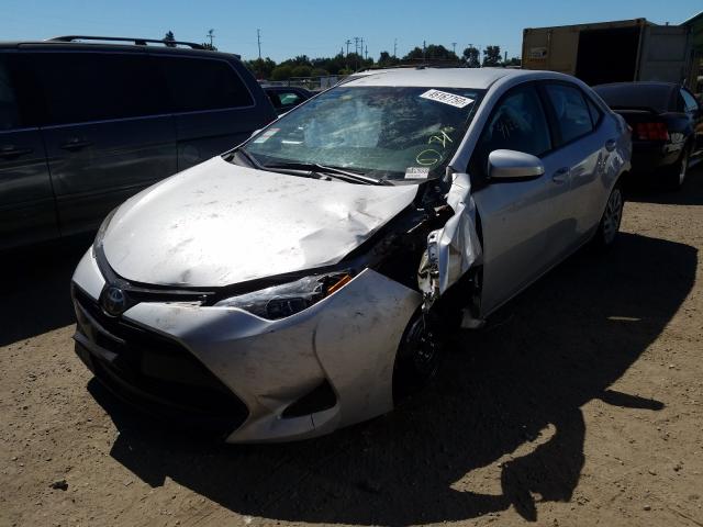 Photo 1 VIN: 2T1BURHE9JC066667 - TOYOTA COROLLA L 