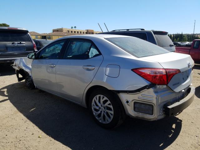 Photo 2 VIN: 2T1BURHE9JC066667 - TOYOTA COROLLA L 