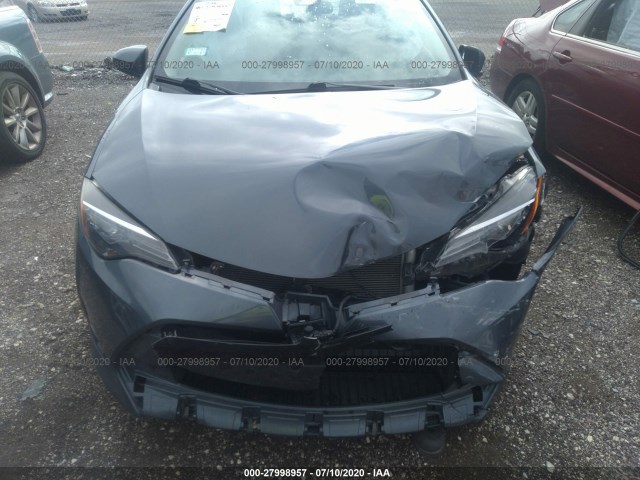 Photo 5 VIN: 2T1BURHE9JC070573 - TOYOTA COROLLA 