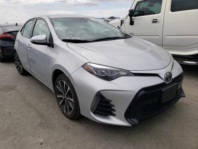 Photo 3 VIN: 2T1BURHE9JC094422 - TOYOTA COROLLA L 