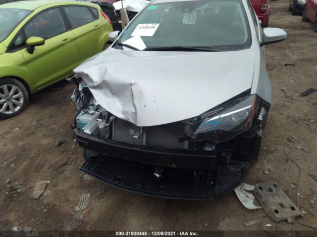 Photo 5 VIN: 2T1BURHE9JC101238 - TOYOTA COROLLA 