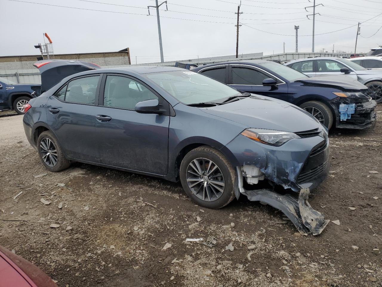 Photo 3 VIN: 2T1BURHE9KC133219 - TOYOTA COROLLA 