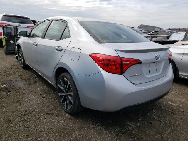 Photo 2 VIN: 2T1BURHE9KC140090 - TOYOTA COROLLA L 