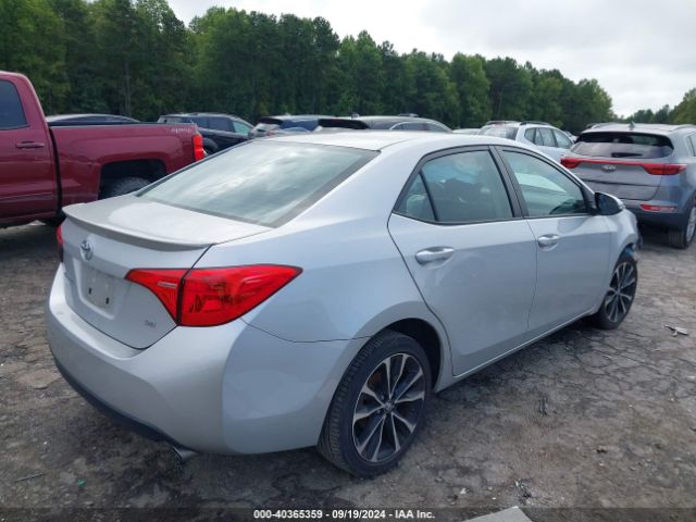 Photo 3 VIN: 2T1BURHE9KC141725 - TOYOTA COROLLA 