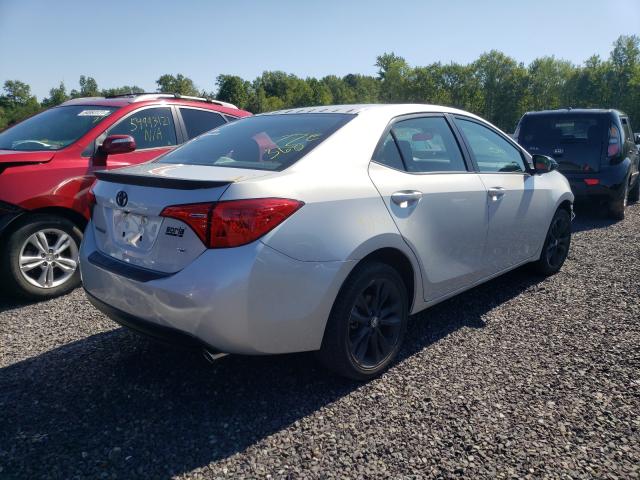 Photo 3 VIN: 2T1BURHE9KC169590 - TOYOTA COROLLA L 