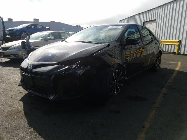 Photo 1 VIN: 2T1BURHE9KC170593 - TOYOTA COROLLA L 