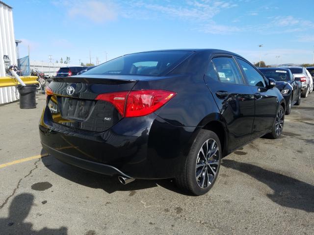 Photo 3 VIN: 2T1BURHE9KC170593 - TOYOTA COROLLA L 