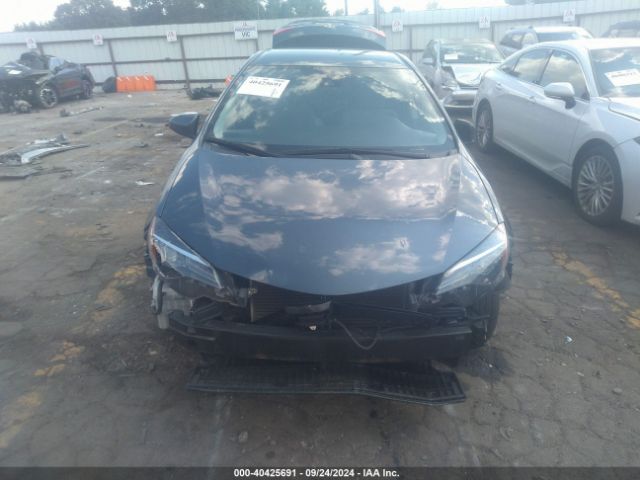 Photo 5 VIN: 2T1BURHE9KC178547 - TOYOTA COROLLA 