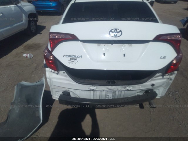 Photo 5 VIN: 2T1BURHE9KC180069 - TOYOTA COROLLA 