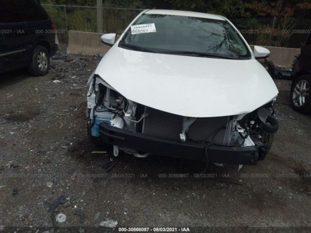 Photo 5 VIN: 2T1BURHE9KC184896 - TOYOTA COROLLA 