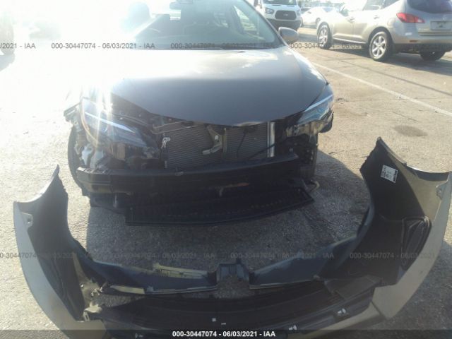 Photo 5 VIN: 2T1BURHE9KC205584 - TOYOTA COROLLA 