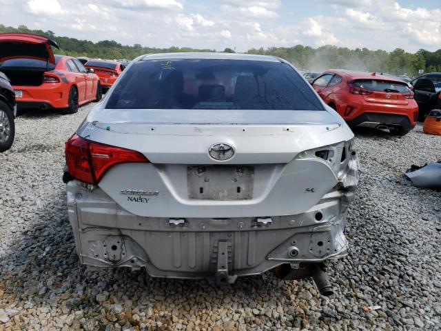 Photo 5 VIN: 2T1BURHE9KC214060 - TOYOTA COROLLA L 