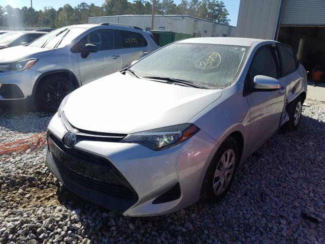 Photo 1 VIN: 2T1BURHE9KC214267 - TOYOTA COROLLA L 