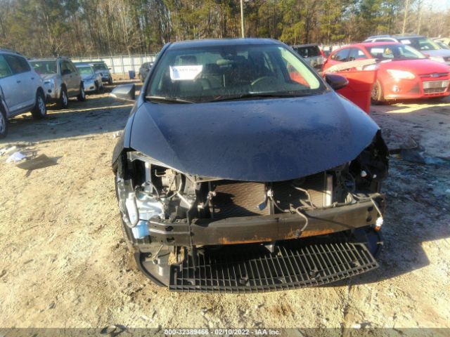 Photo 5 VIN: 2T1BURHE9KC218481 - TOYOTA COROLLA 