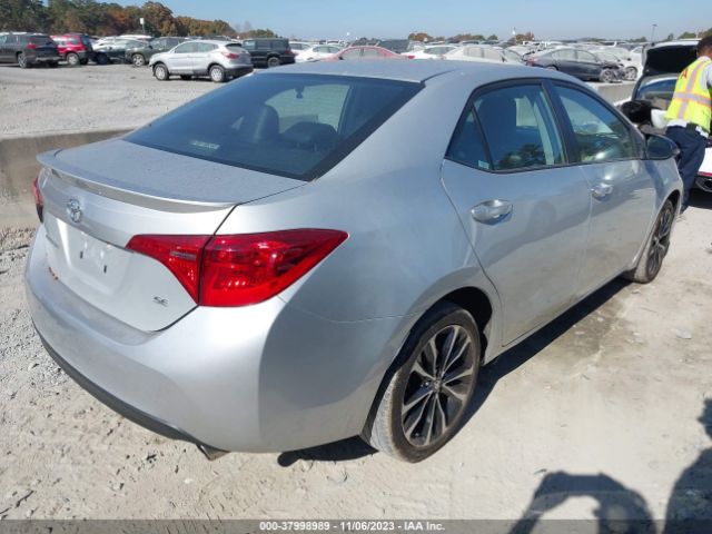 Photo 3 VIN: 2T1BURHE9KC238469 - TOYOTA COROLLA 