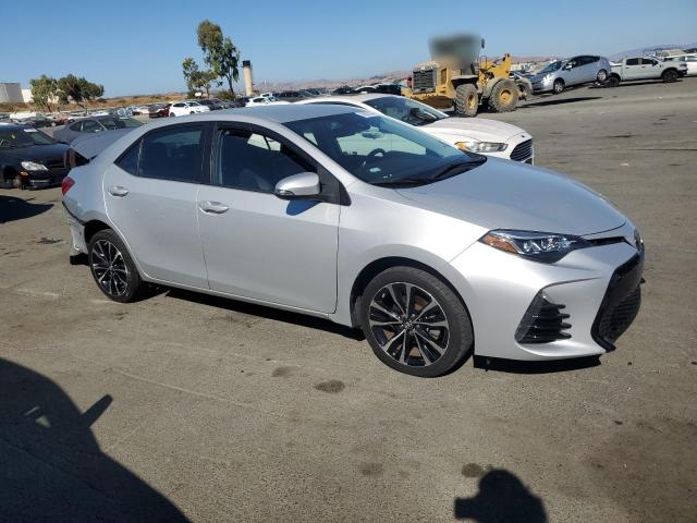 Photo 3 VIN: 2T1BURHEXJC063888 - TOYOTA COROLLA L 