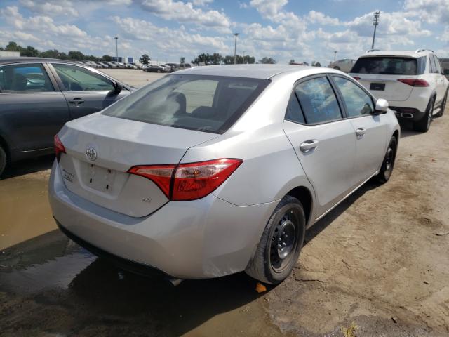 Photo 3 VIN: 2T1BURHEXJC968907 - TOYOTA COROLLA L 