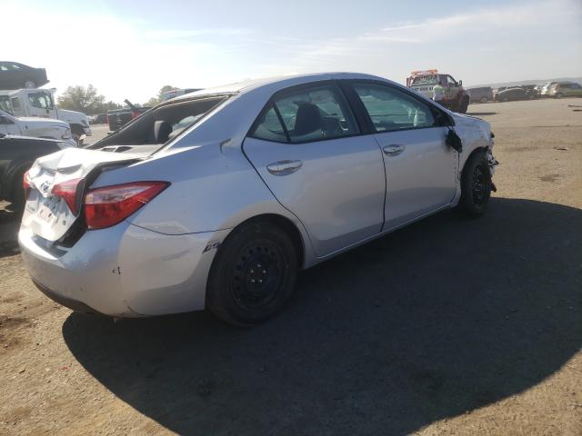 Photo 3 VIN: 2T1BURHEXKC145945 - TOYOTA COROLLA L 