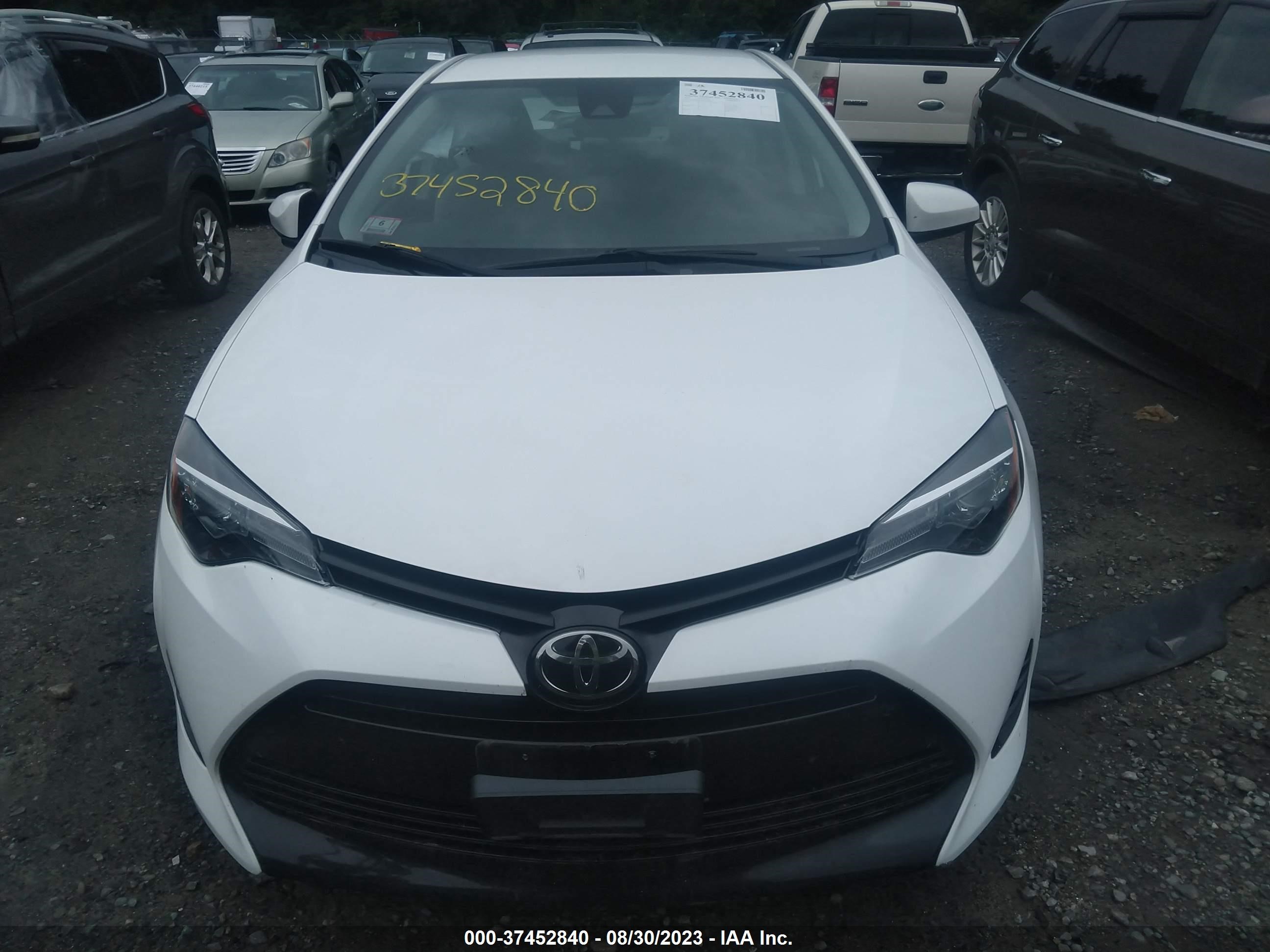 Photo 11 VIN: 2T1BURHEXKC155844 - TOYOTA COROLLA 