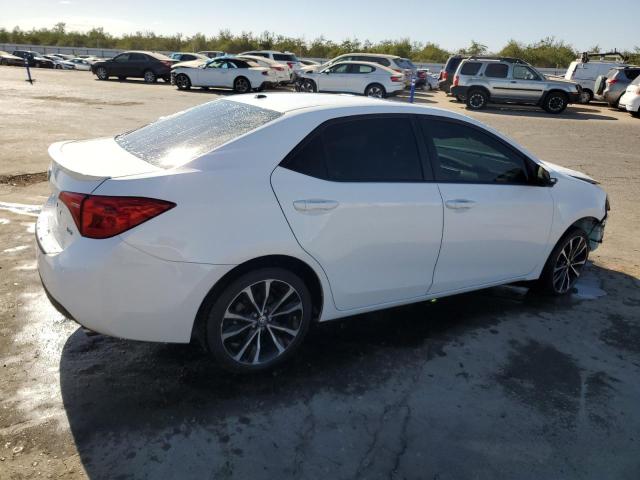 Photo 2 VIN: 2T1BURHEXKC179061 - TOYOTA COROLLA L 