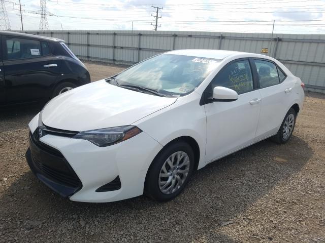 Photo 1 VIN: 2T1BURHEXKC216027 - TOYOTA COROLLA L 