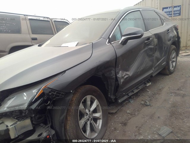 Photo 5 VIN: 2T2BGMCA6KC033590 - LEXUS RX 450H 