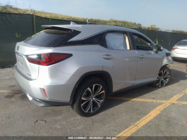 Photo 3 VIN: 2T2BGMCA9JC028883 - LEXUS RX 450H 