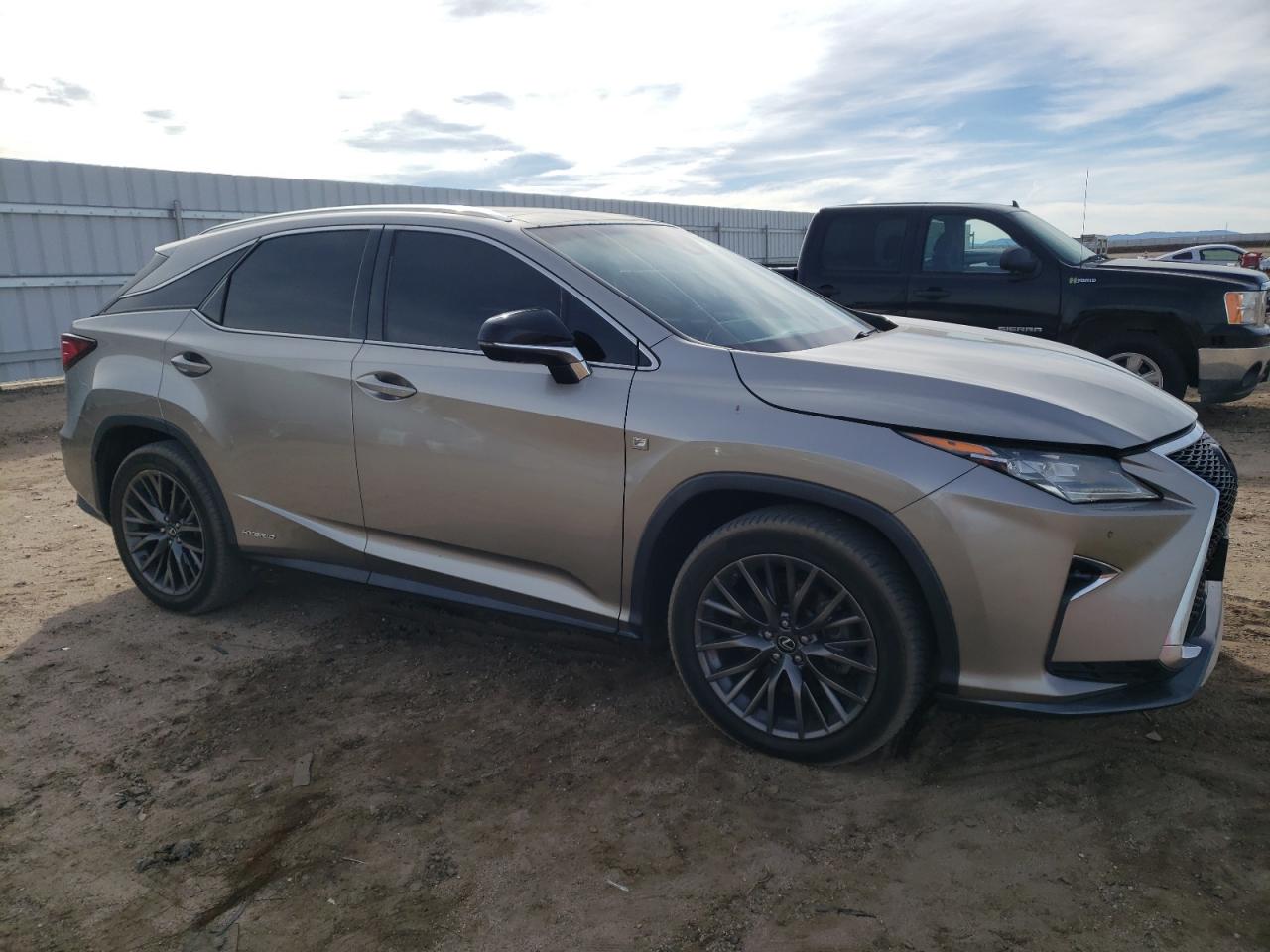 Photo 3 VIN: 2T2BGMCAXJC020811 - LEXUS RX 