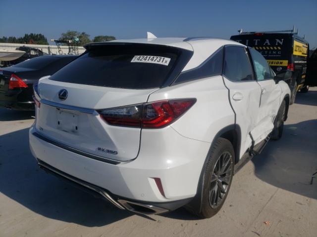 Photo 3 VIN: 2T2BZMCA2KC210811 - LEXUS RX 