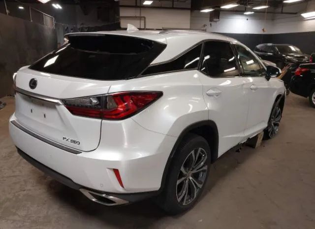 Photo 3 VIN: 2T2BZMCA3GC049036 - LEXUS RX 350 