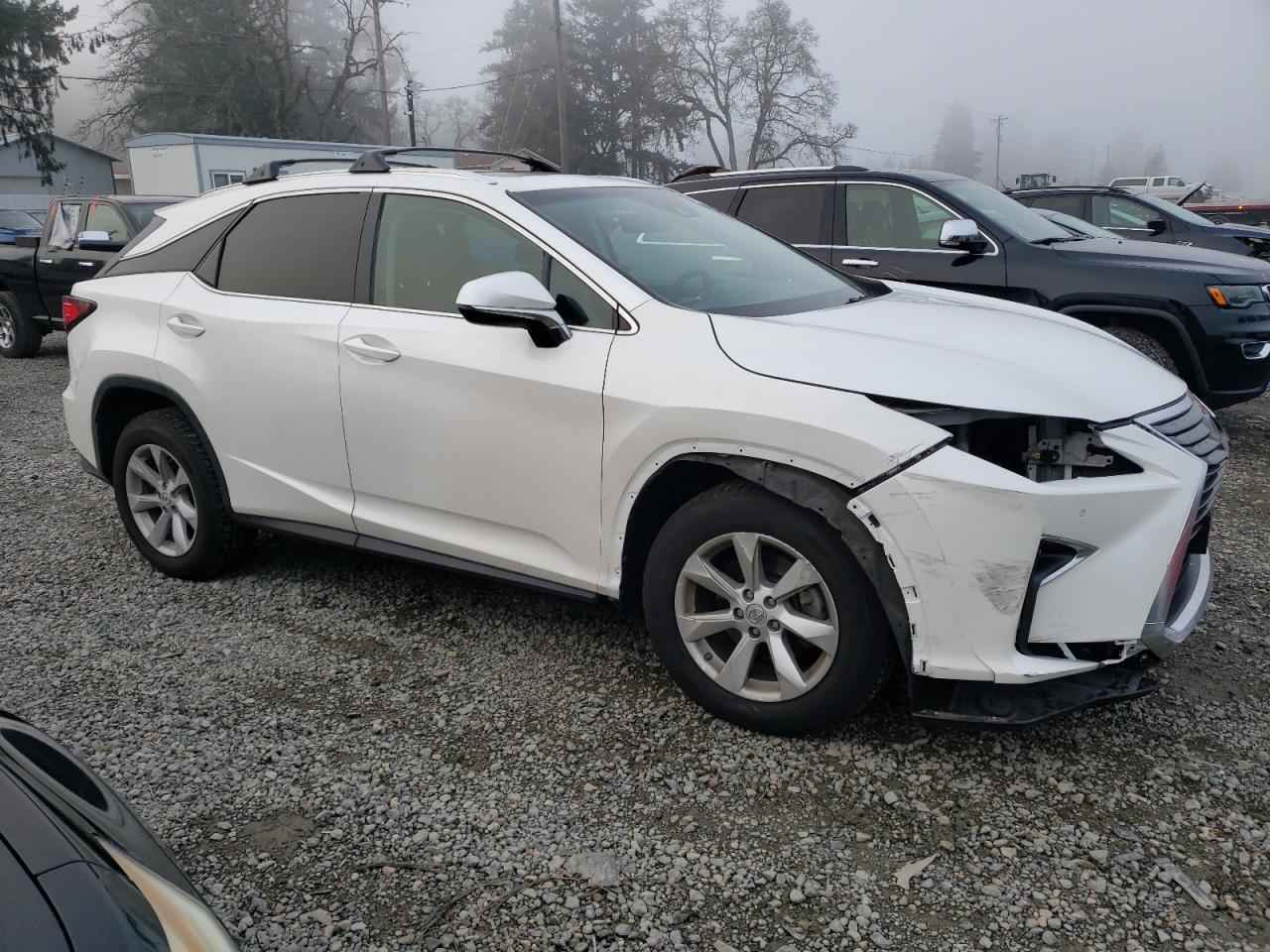 Photo 3 VIN: 2T2BZMCA3HC095483 - LEXUS RX 