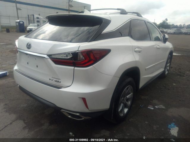 Photo 3 VIN: 2T2BZMCA5KC169560 - LEXUS RX 