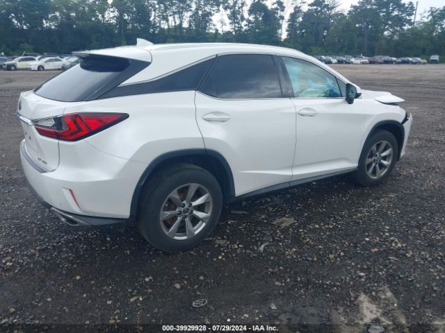 Photo 3 VIN: 2T2BZMCA7KC200629 - LEXUS RX 