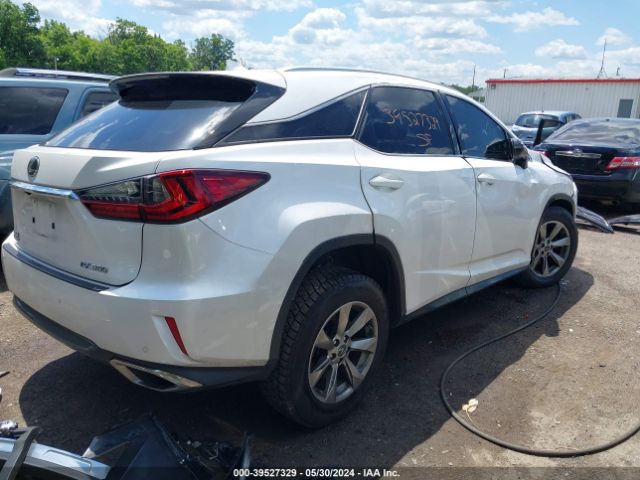 Photo 3 VIN: 2T2BZMCA7KC204552 - LEXUS RX 