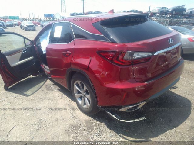 Photo 2 VIN: 2T2BZMCA7KC211386 - LEXUS RX 