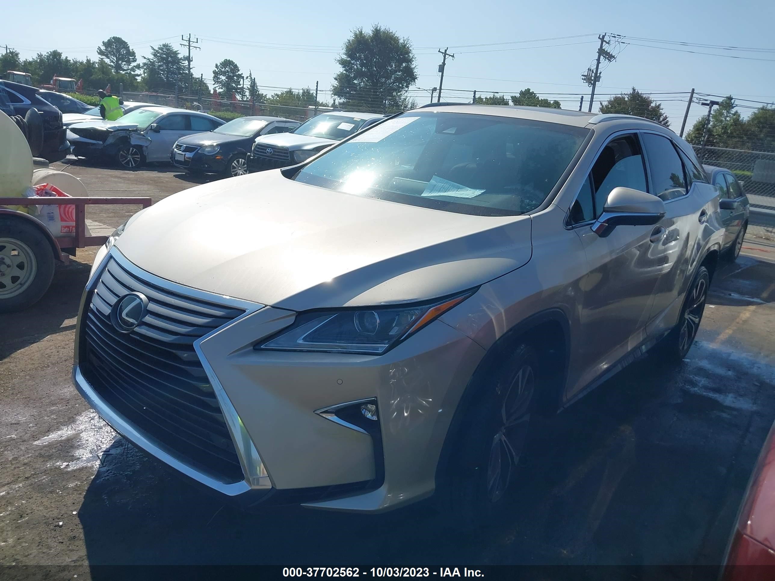 Photo 1 VIN: 2T2BZMCA8GC043605 - LEXUS RX 