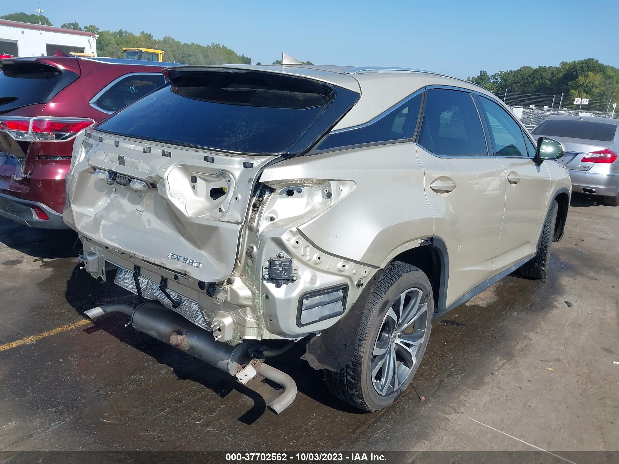 Photo 3 VIN: 2T2BZMCA8GC043605 - LEXUS RX 