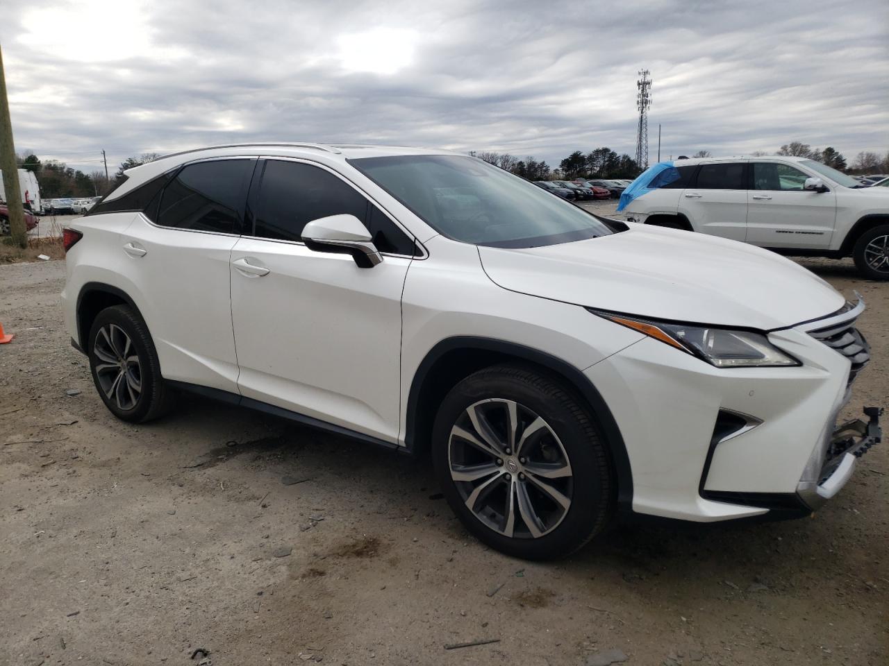 Photo 3 VIN: 2T2BZMCA9HC059359 - LEXUS RX 