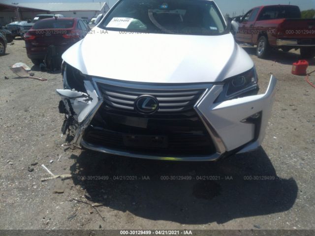 Photo 5 VIN: 2T2BZMCA9KC197748 - LEXUS RX 