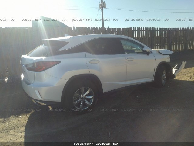 Photo 3 VIN: 2T2BZMCAXKC210135 - LEXUS RX 