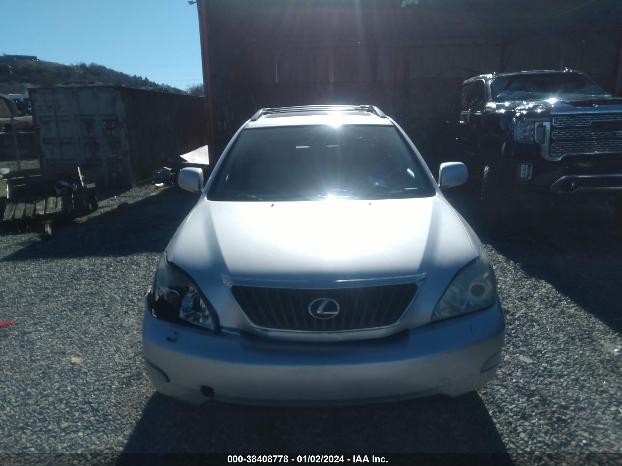 Photo 11 VIN: 2T2GK31U09C057065 - LEXUS RX 