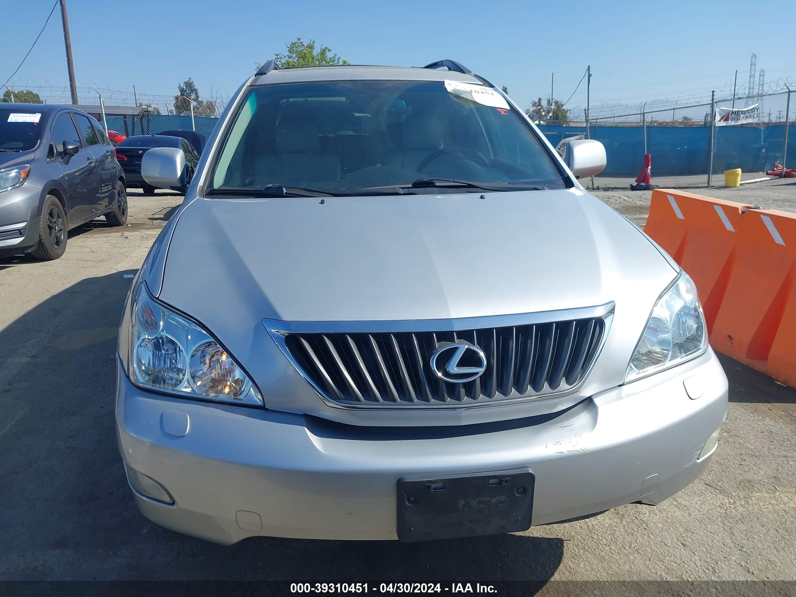 Photo 12 VIN: 2T2GK31U19C079835 - LEXUS RX 