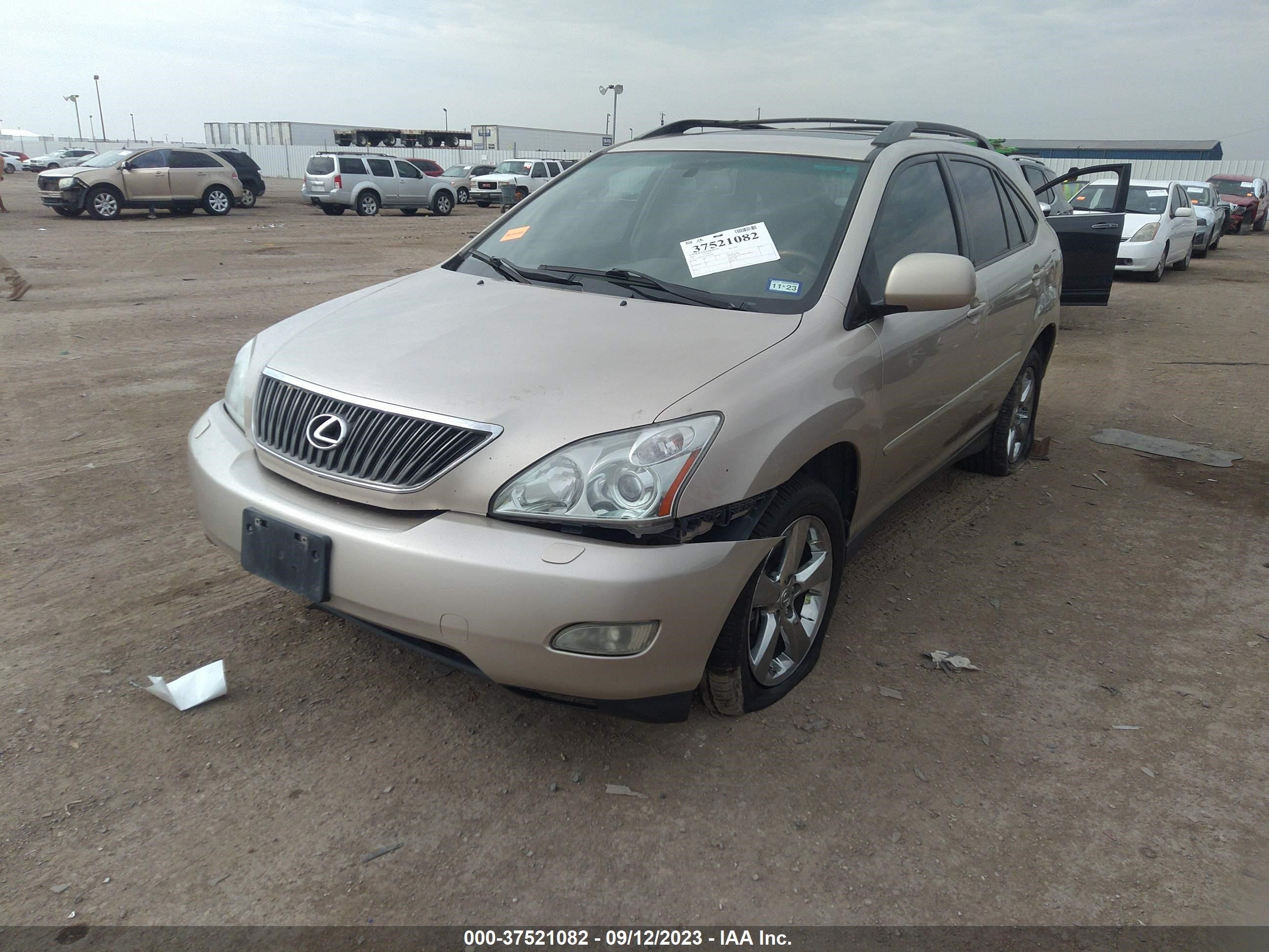 Photo 1 VIN: 2T2GK31UX7C015662 - LEXUS RX 