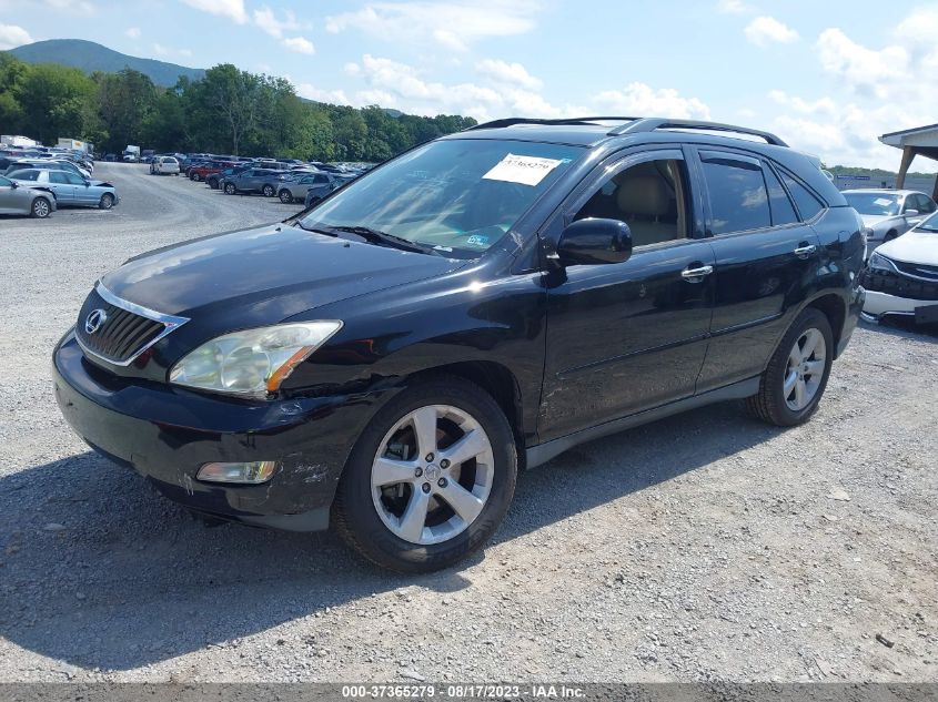 Photo 1 VIN: 2T2GK31UX8C042409 - LEXUS RX 