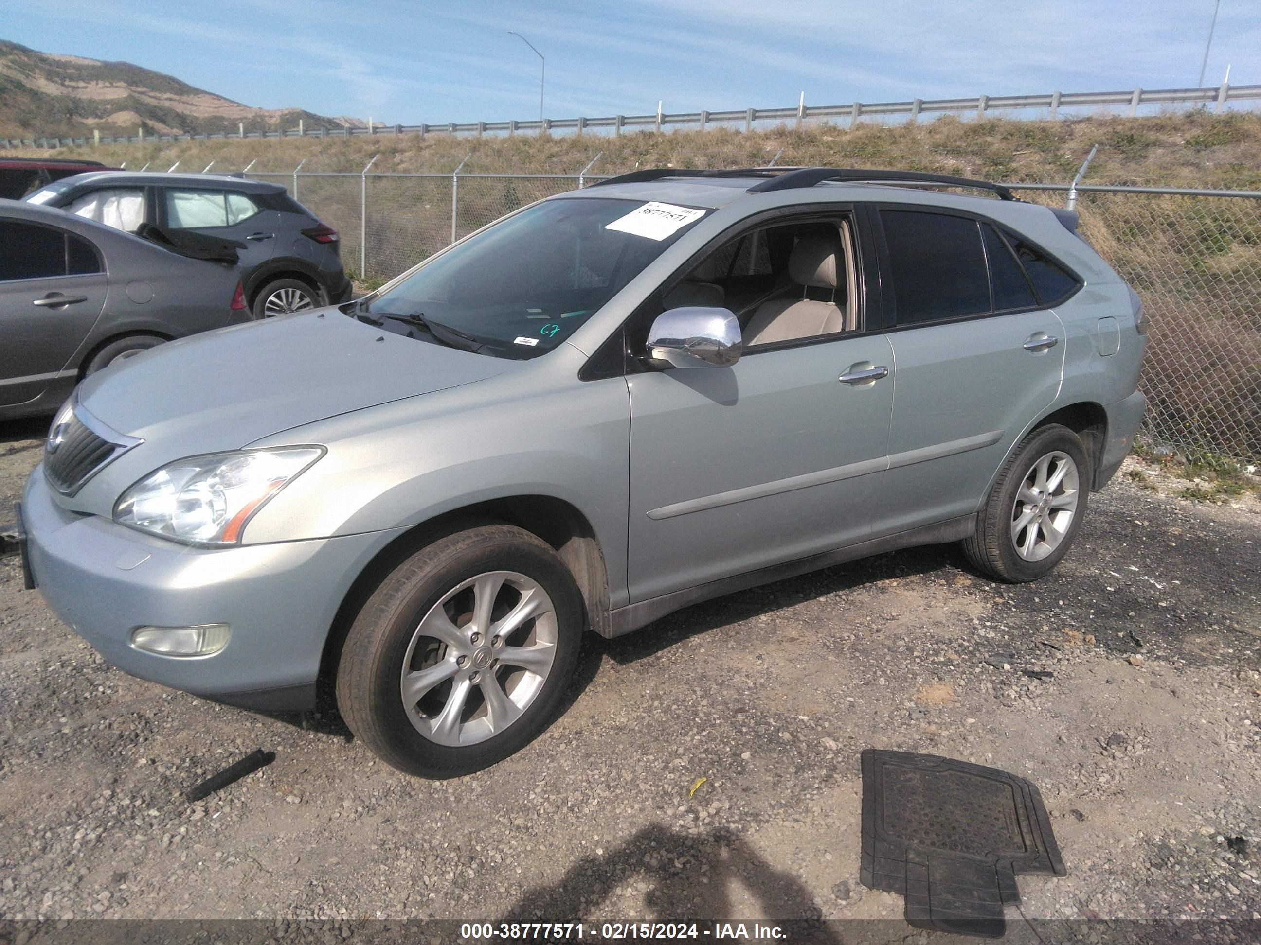 Photo 1 VIN: 2T2GK31UX8C051000 - LEXUS RX 