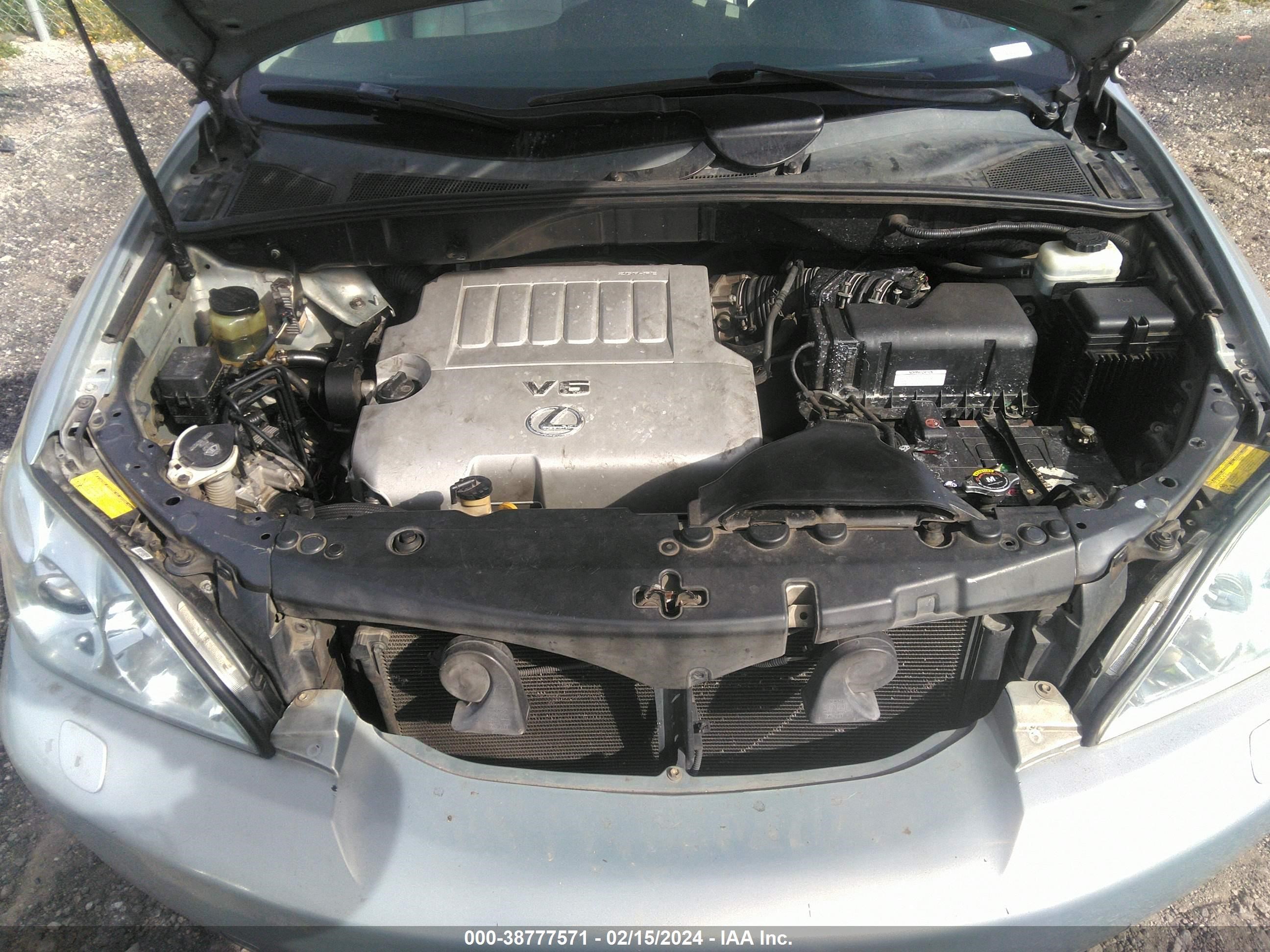 Photo 9 VIN: 2T2GK31UX8C051000 - LEXUS RX 